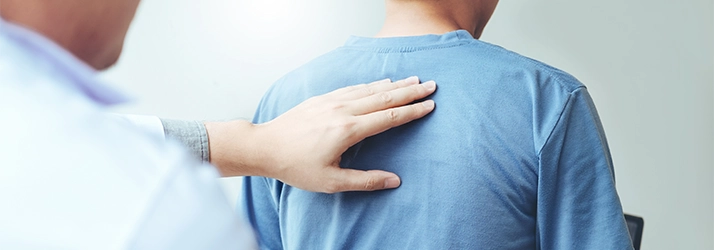 Chiropractic Lansing MI Back Exam Patient