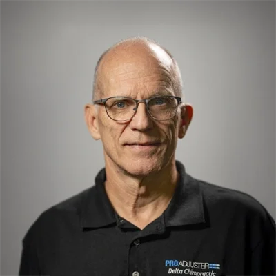 A headshot of Dr. Charles Roost, a chiropractor at Delta Chiropractic Center.